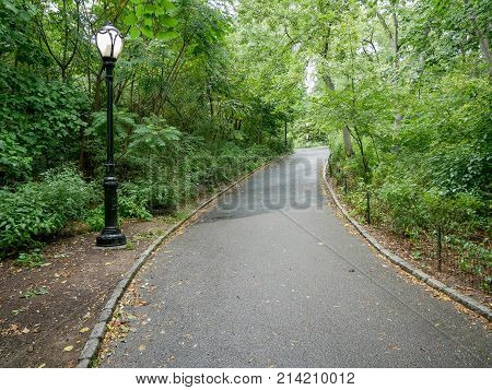NEW YORK - SEP 2017: Walkway in Autumn Central Park New York City