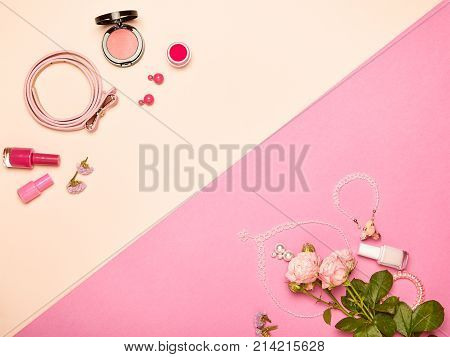 Fashionable Women's Cosmetics and Accessories. Falt Lay. Nail Polish and blush. Jewelry and Rings. A bouquet of flowers. Pink roses