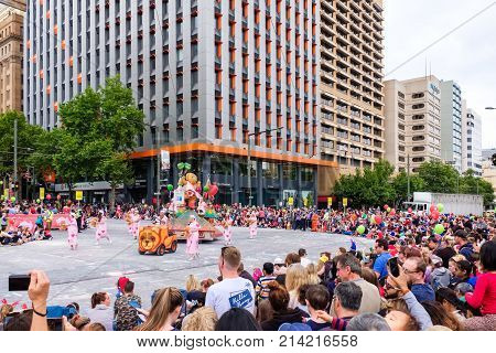 Adelaide Australia - November 18 2017: Parade participants walk along crowd of people during Adelaide's 85th Credit Union Christmas Pageant parade