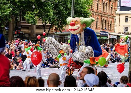Adelaide Australia - November 18 2017: Parade participants walk along crowd of people during Adelaide's 85th Credit Union Christmas Pageant parade