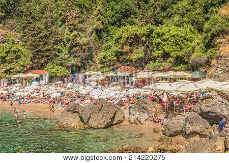 Budva, Montenegro - August 18, 2017: Fragment of Mogren beach in Budva, Montenegro is one of the most popular beaches on the Budva Riviera.