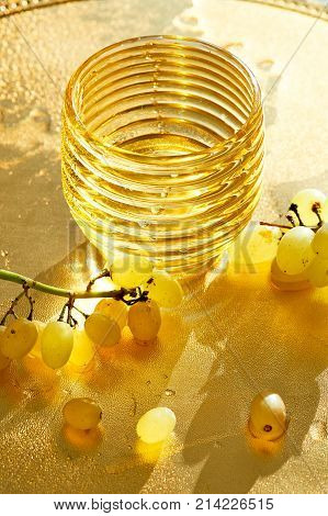 Golden texture. Konzerte wealth, fullness and freshness. Water and grapes
