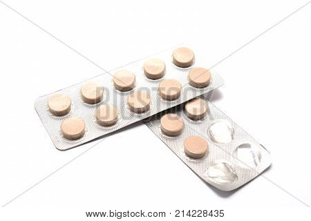 two packs of pills isolated on white background