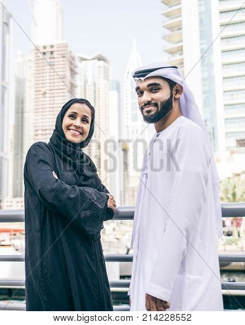 Arabic couple with traditional clothes dating outdoors