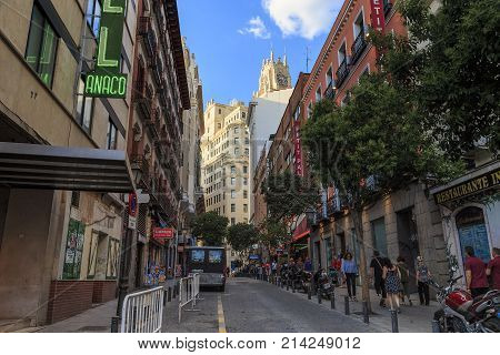 MADRID, SPAIN - MAY 24, 2017: The Las Tres Cruses Street is one of the typical old small streets in the city center next to Puerta del Sol.