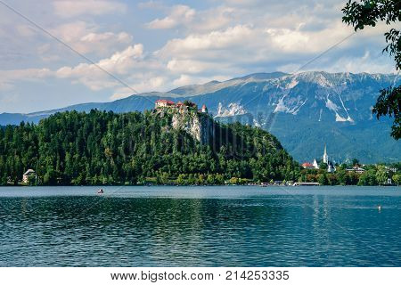 Colorful summer scene on the Bled lake with medieval castle Blejski grad. Slovenia, Europe.