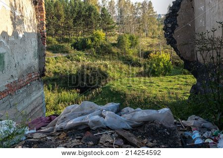 Pile of old rubbish or garbage in ruined house. Illustration of anthropogenic pollution of environment