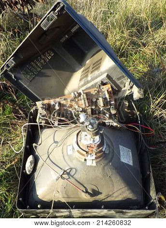 the TV, kinescope, old, broken, sorted, a grass, the nature