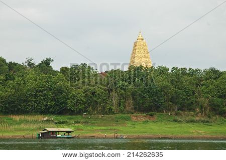 Tall Sacred Golden Pagoda In Sangkalaburi Province Thailand