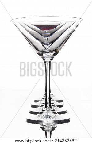 Glass with a red wine on a glass studio background