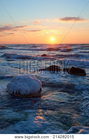 On the shore of the Caspian Sea. Caspian Sea in Kazakhstan.
The Caspian Sea is the largest enclosed inland body of water on Earth by area, variously classed as the world's largest lake or a full-fledged sea.