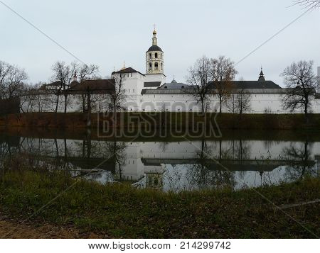 Monastery surrounded by a waking spring nature