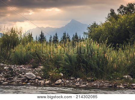 Bela River Bank with Krivan Peak in Background in Slovakia