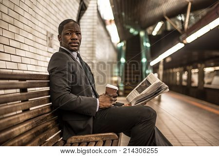 Businessman in full suit in New York subway metro