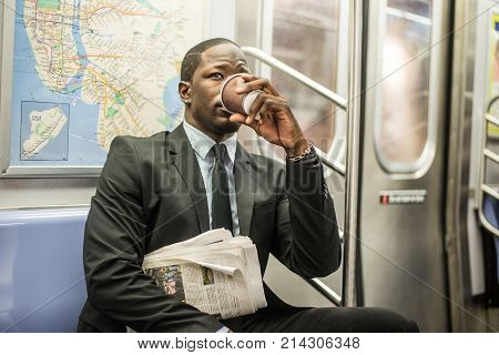 Businessman in full suit in New York subway metro