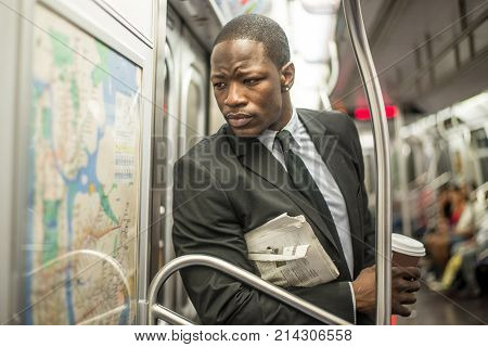 Businessman in full suit in New York subway metro