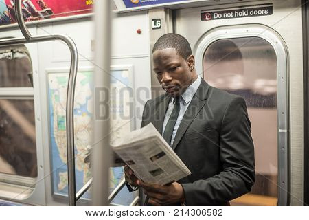 Businessman in full suit in New York subway metro