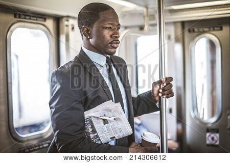 Businessman in full suit in New York subway metro