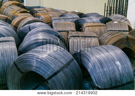Rolls of aluminum metal fittings steel armature . Heavy industry production. Metal rolling plant