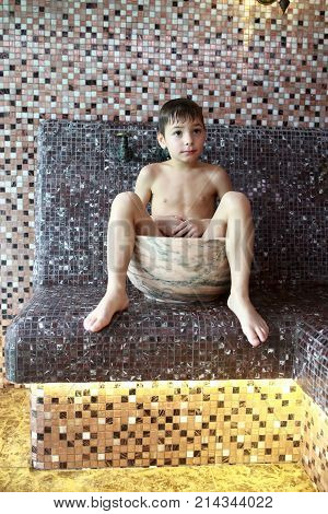 Preschooler Sitting In Hammam