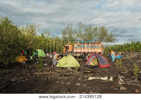 Kamchatka Peninsula, Russia - August 20, 2016: Tourist camp on the shore of river Studenaya. Kamchatka Peninsula.