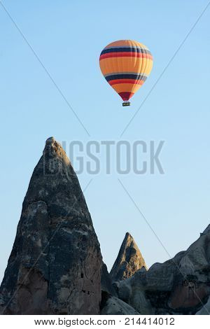 Balloon silhouette in the sunrise sky