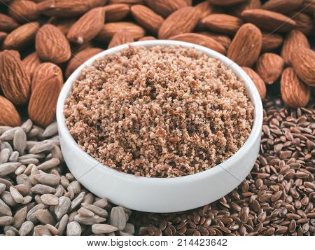 Homemade LSA mix in plate - Linseed or flax seeds, Sunflower seeds and Almonds. Traditional Australian blend of ground, source of dietary fiber, protein, omega fatty acids. Copy space for text.