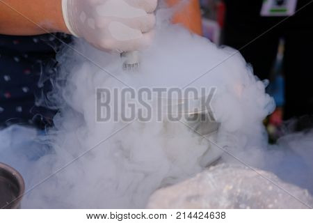 Chef Making Cryogenic Ice Cream With Liquid Nitrogen