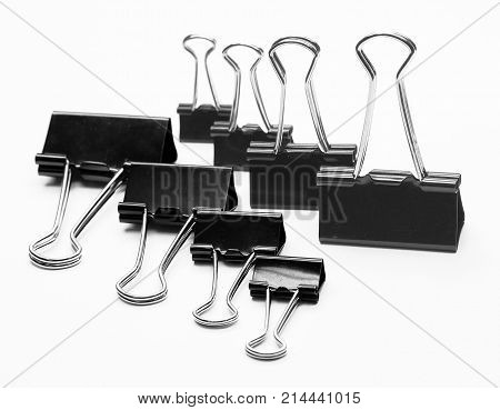 binder clips isolated on white background paper accessory black business
