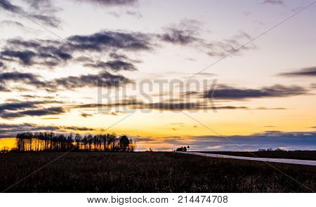 Autumn road home suitcase travel the road in the evening