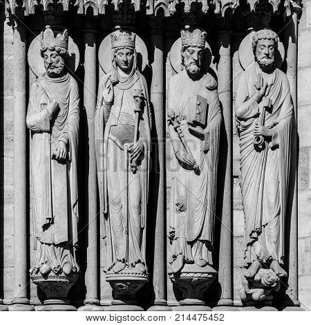 Architectural details of the catholic cathedral Notre-Dame de Paris. Built in French Gothic architecture Notre-Dame's facade showing details of the Portal of St.Anne. Paris France