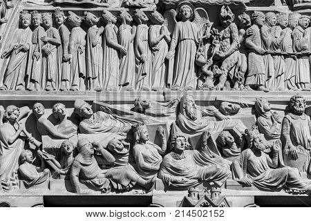 Architectural details of the catholic cathedral Notre-Dame de Paris. Built in French Gothic architecture Notre-Dame's facade showing details of the Portal of the Last Judgment. Paris France
