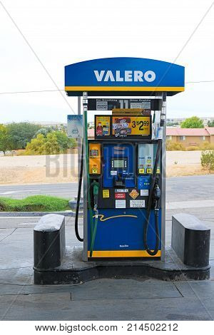 Barstow, California, USA - Oct 29, 2015 : Fuel pumps at a Valero and Diamond Shamrock gas station.
