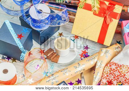 A Package Of Christmas Gift Box. Christmas Christmas Wrapping Paper, Ribbon, Bow And String, Scissor