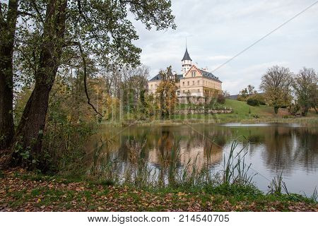 Old and historic castle Radun in the mirror of the pond, Northern Moravia, Czech Republic