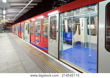 London, UK. 18th November 2017. Train at Poplar station on the Docklands Light Railway in London