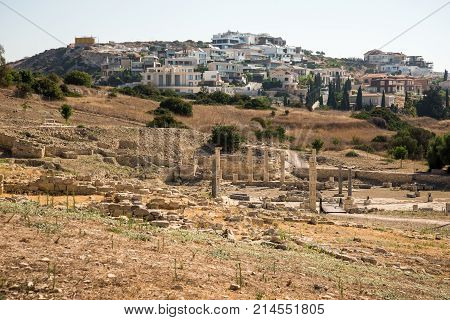 Ruins of Amathus ancient city with modern residential houses in background Limassol Cyprus