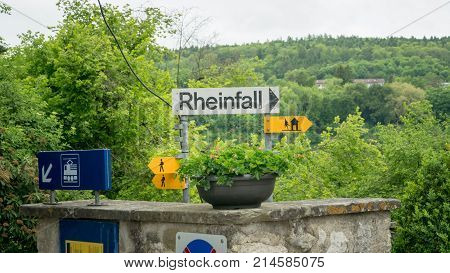 Laufen Switzerland - May 2017 The sign bearing the German name of the Rhine Falls Rheinfall. Laufen castle is a castle overlooking the Rhine Falls.