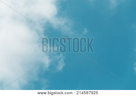 Glider Gliding In Blue Sky From Below