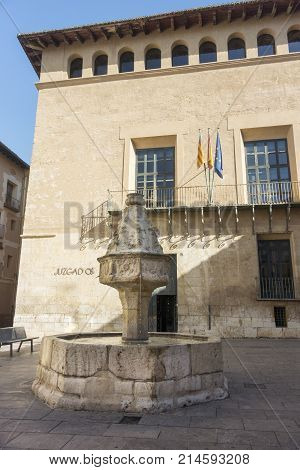 XATIVA, VALENCIA, SPAIN, 1ST FEBRUARY 2017 - Alarcon Palace and 15thC Trinity fountain Xativa (Jativa) Valencia Spain