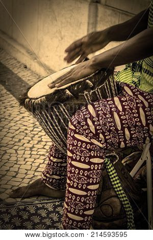 Sounds and tribal rhythms played with a drum