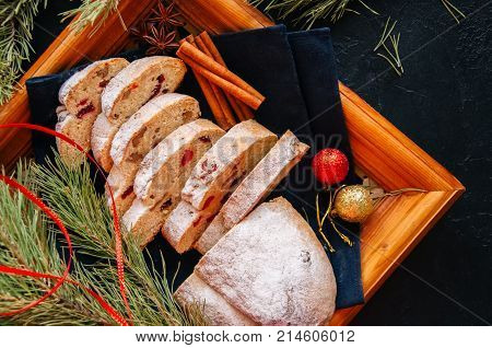 Slices Of Dresden Stollen With Dried Cranberies And Nuts. Festive European Dessert. Christmas Baking
