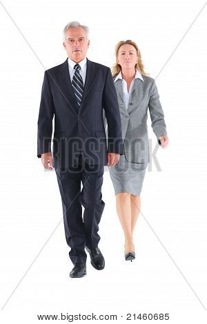 businessman and businesswoman walking in white background