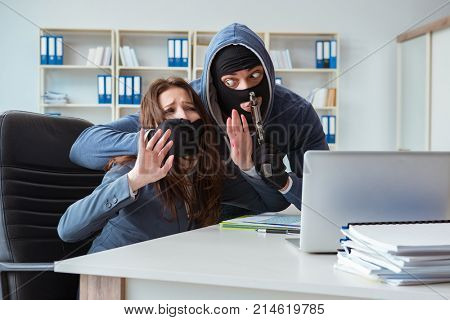 Criminal taking businesswoman as hostage in office