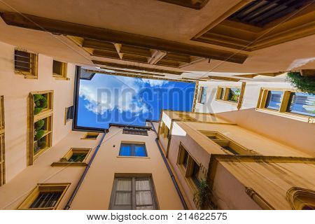 Old medieval courtyard Traboules in Lyon France - travel and architecture background