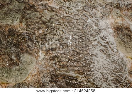 Water on natural mineral lodgments