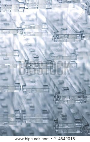 Abstract high-tech background. Details of transparent plastic or glass. Laser cutting of plexiglass.