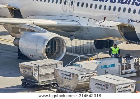 BUDAPEST, HUNGARY - MARCH 23, 2017: Cargo containers loaded into a Lufthansa aircraft at Budapest Liszt Ferenc Internetional Airport