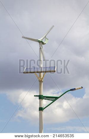 Street lamp post with solar panel and a small wind turbine in Dali city ,Yunnan China.