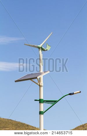 Street lamp post with solar panel and a small wind turbine in Dali city ,Yunnan China.